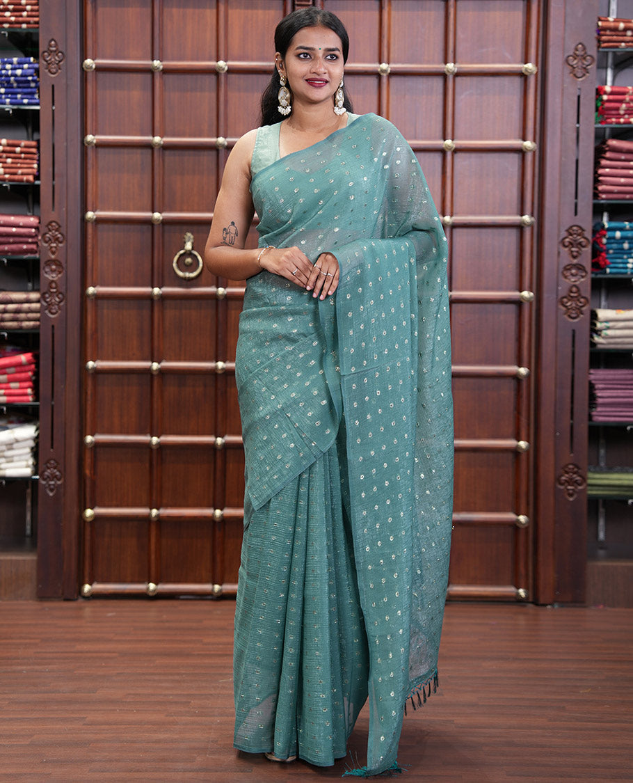Borderless Blue Shimmer Saree, Subtly Sparkled with Zari Buttas All Over Its Body, Pallu Mirrors the Same Buttas, and Comes Without a Blouse