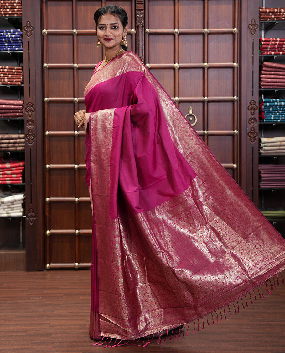 Pink Plain Semi-Soft Silk Saree, Elevated with Traditional Zari Designs Woven Border, Grandly Woven Pallu Steeped with Chakram Designs, and Paired with a Matching Blouse