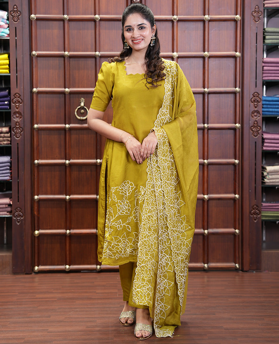 Yellow Organza Crushed Material Churidar Set, Elegantly Adorned with Floral-Themed Thread Embroidery Top, Comes with a Plain Santoon Bottom, and Is Paired with Organza Crushed Dupatta of Floral Thread Embroidery