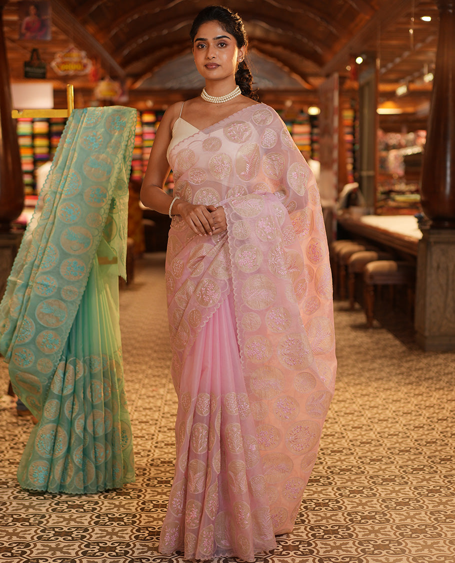 Pearl Pink Organza Saree, Delicately Threaded with Floral Enclosed Circle Motifs Embroidery, Subtle Scallop Border, Delicately Embroidered Pallu, and Paired with a Matching Embroidered Blouse
