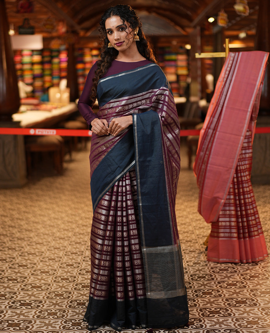 Wine Organza Saree, Richly Zari Detailed with Geometric and Elephant Motifs All Over Its Body, Complemented by Captivating Contrast Zari Border, Zari Decked Up Pallu, and Paired with a Contrast Blouse