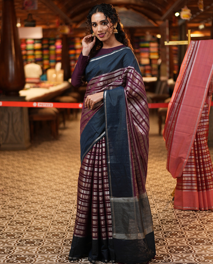 Wine Organza Saree, Richly Zari Detailed with Geometric and Elephant Motifs All Over Its Body, Complemented by Captivating Contrast Zari Border, Zari Decked Up Pallu, and Paired with a Contrast Blouse