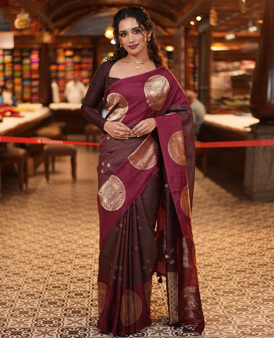 Coffee Maroon H O-Silk Saree, Richly Detailed with Zari Buttas and Zari Checks On Its Body, Accentuated with Contrast Big Chakram Motifs Woven Border, Grand Jaal Design Woven Pallu, and Paired with a Checked Blouse