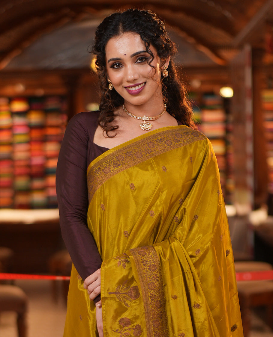 Green HO-Silk Saree, Adorned with Zari Buttas All Over Its Body, Highlighted by a Self-Border of Floral Designs, Pallu Features Floral Designs, and Paired with a Buttas-woven Blouse