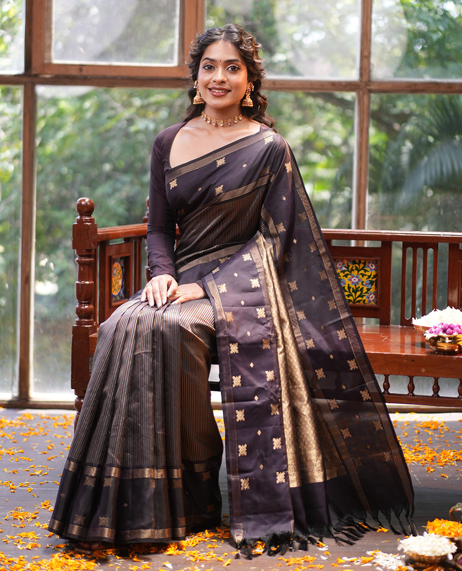 Dark Brown Vasundhara Silk Saree, Elevated with Thick Vaira Oosi-style Stripes On Its Body, Highlighted by Zari Unique Design Border, Grand Jaal Pallu, and Paired with a Matching Blouse