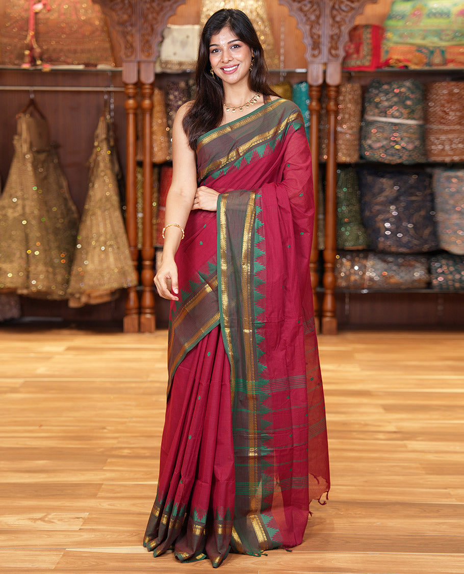 Maroon Chettinad Cotton Saree, Subtly Sparkled with Thread Buttas All Over Its Body, Complemented by a Contrast Border Rettai Pettu Border of Paisley and Chevron Stripes, Subtly Designed Pallu, and Paired with a Matching Blouse