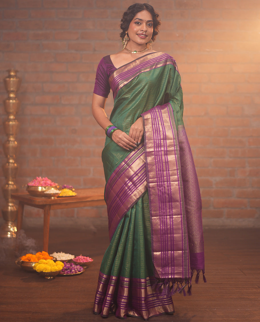 Green and Magenta Vasundhara Silk Saree, Enriched with Veldhari and Muthu Stripes On Its Body, Complemented by Contrast Border of Muthu, Lavangam, Neli, Mayil Kann, And Mayil Designs, Grand Pallu, and Paired with a Contrast Blouse