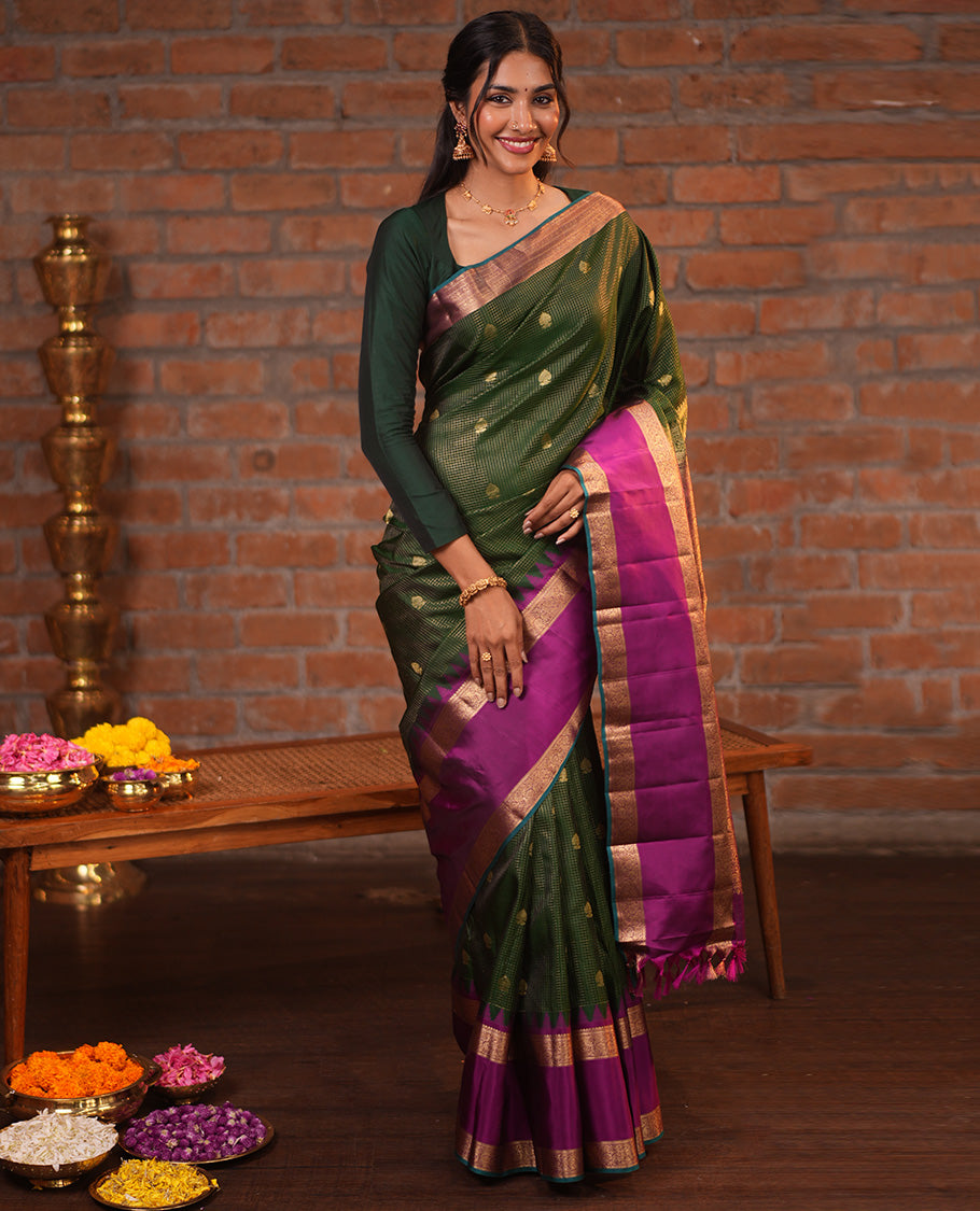 Dark Green and Magenta Vasundhara Silk Saree, Elevated with Zari Buttas and Zari Checks On Its Body, Complemented by Contrast Thazampoo Rekku Rettai Pettu Border of Salngai, and Mayil Designs, Grand Pallu, and Paired with a Contrast Blouse