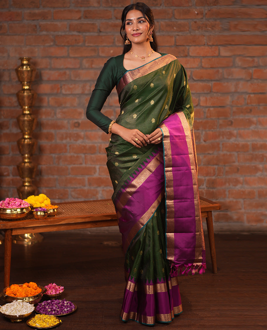 Dark Green and Magenta Vasundhara Silk Saree, Elevated with Zari Buttas and Zari Checks On Its Body, Complemented by Contrast Thazampoo Rekku Rettai Pettu Border of Salngai, and Mayil Designs, Grand Pallu, and Paired with a Contrast Blouse