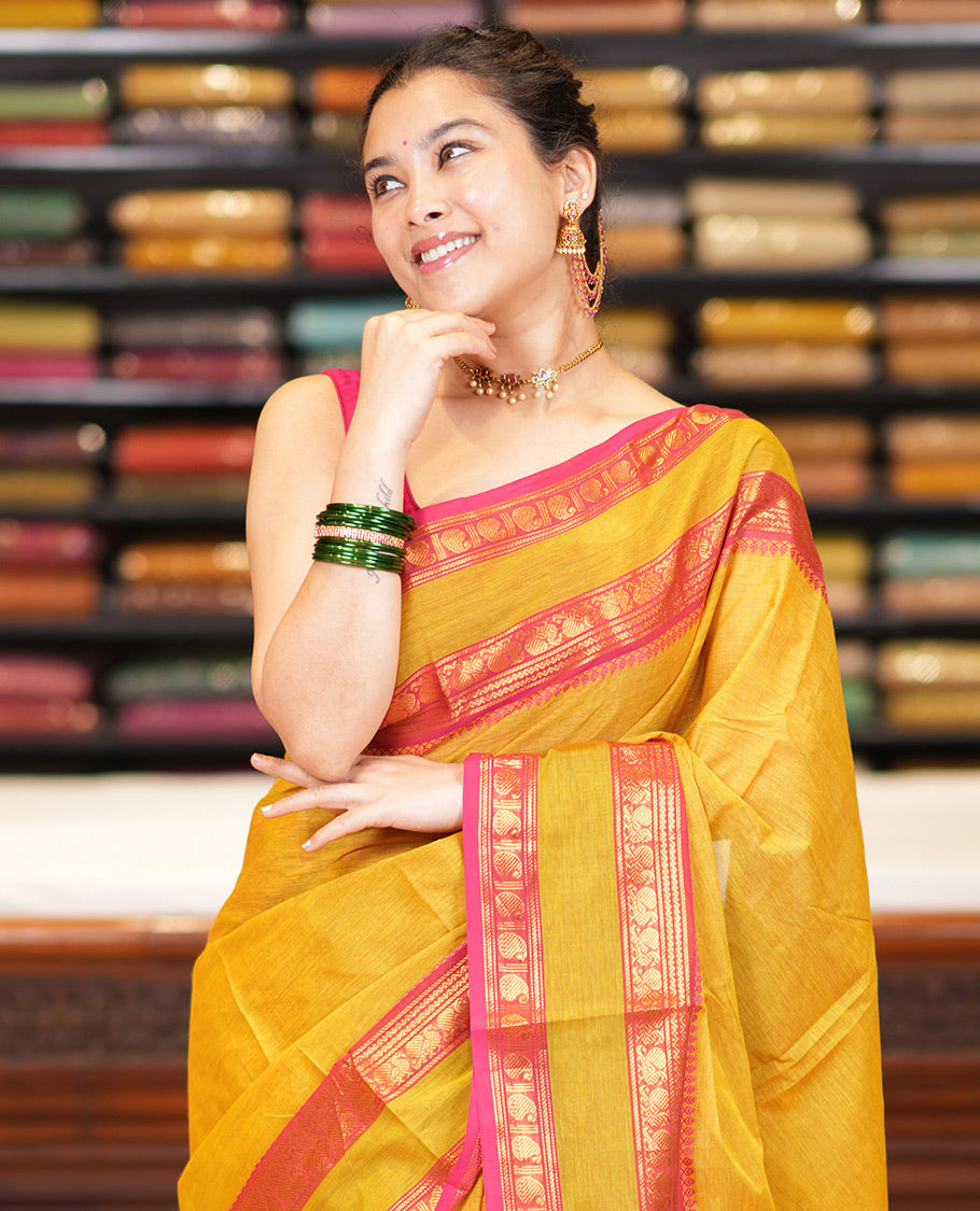 Lemon Yellow Plain Chettinad Cotton Saree, a Contrast Traditional Thread Rettai Pettu Border, Striped Pallu, a Matching Blouse
