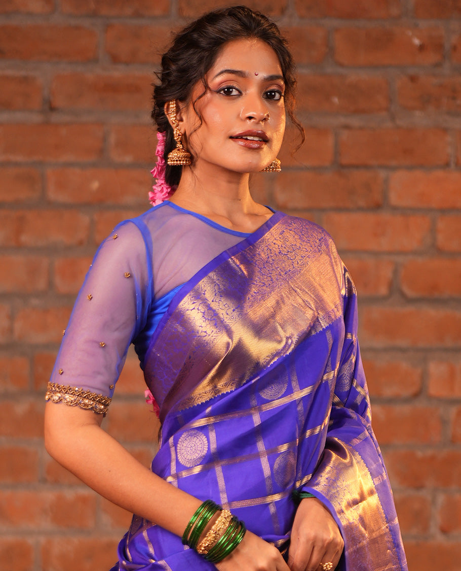 M.s Blue Vasundhara Silk Saree Features Zari Butta Enclosed Checks, a Zari Border of Mayil Kann and Kodi Visiry, Jaal Pallu, and Comes with a Matching Blouse