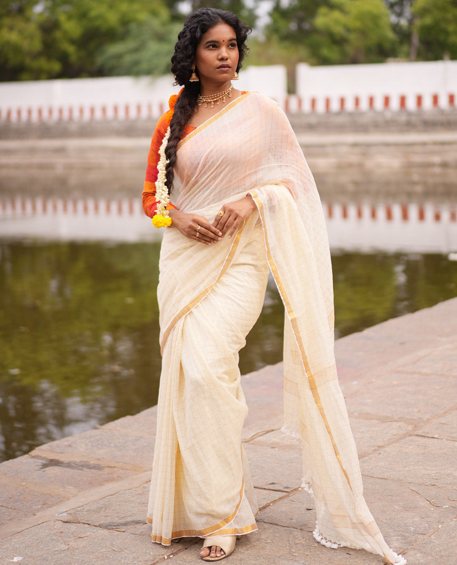 Cream Khadi Mul Cotton Saree, Subtly Sparkled With Zari Checks, a Zari Piping Border and No Blouse