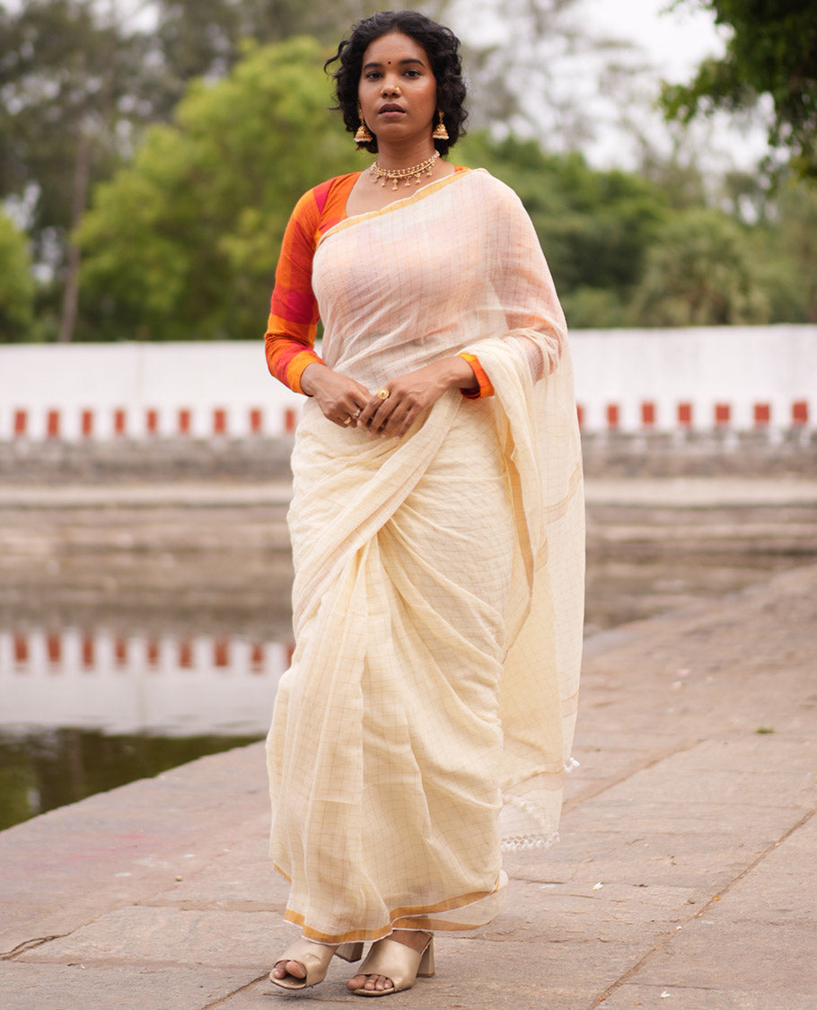 Cream Khadi Mul Cotton Saree, Subtly Sparkled With Zari Checks, a Zari Piping Border and No Blouse