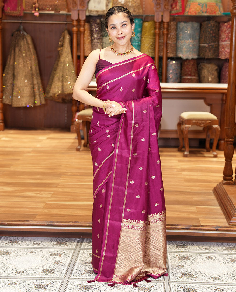 Magenta Pink Semi-Banaras Satin Silk Saree, Ornamented with Zari Buttas All Over Its Body, Highlighted by Zari Striped Border, Grand Jaal Pallu, and Paired with a Matching Blouse