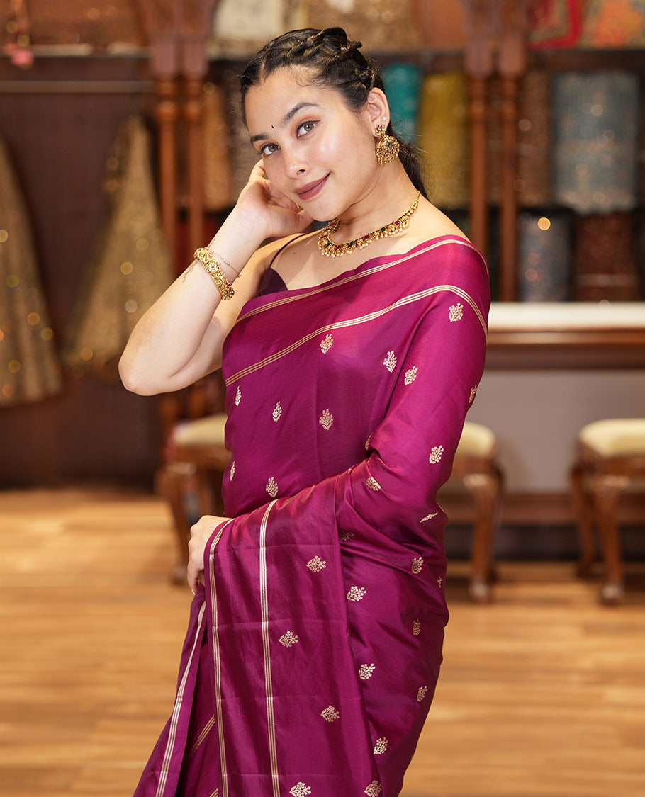 Magenta Pink Semi-Banaras Satin Silk Saree, Ornamented with Zari Buttas All Over Its Body, Highlighted by Zari Striped Border, Grand Jaal Pallu, and Paired with a Matching Blouse