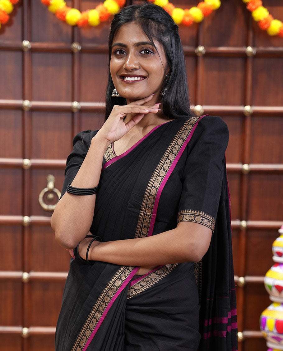 Black plain mercerised cotton saree, contrast temple traditional border, striped pallu, and a matching blouse