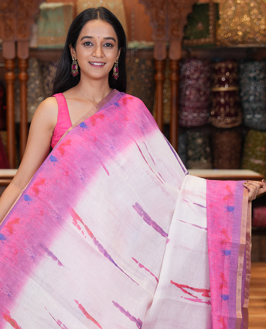 White-Magenta Linen Cotton Saree Features Watercolor Painting-style Shibori Print, Contrast Printed Border, Printed Pallu, and a Contrast Blouse
