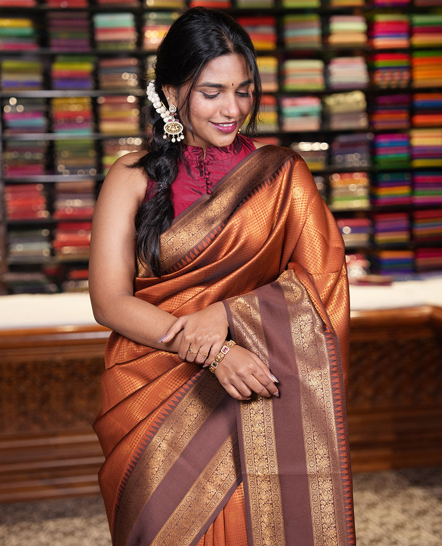 Rust orange-brown checked and peacock chakra zari buttas kanchi silk saree, contrast traditional zari rettai pettu border, jaal pallu, and a jacquard blouse