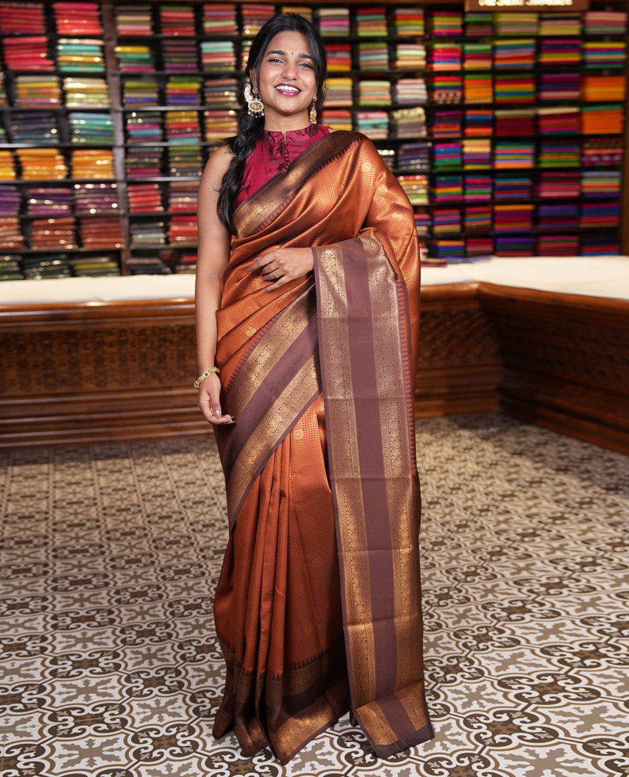 Rust orange-brown checked and peacock chakra zari buttas kanchi silk saree, contrast traditional zari rettai pettu border, jaal pallu, and a jacquard blouse