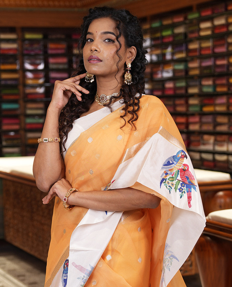 Mustard zari buttas fancy organza saree, contrast satin with small zari border of macaw parrot motifs digital print, zari pallu, and a running blouse