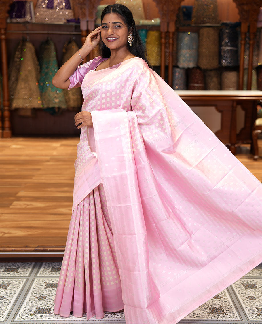 Pink Kanchi Silk Saree, Embellished with Checked Design on Its Body, Highlighted by a Self-Border of Diamond Patterns, Pallu Steeped with Buttas, and Paired with a Matching Blouse