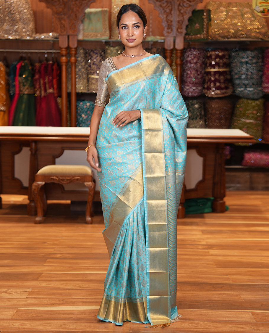 Sky Blue Budget Silk Saree, Enriched with Zari Buttas All Over Its Body, Highlighted by Traditional Zari Designs Woven Border, Grand Pallu, Paired with a Matching Blouse - Inspired by Trisha Blue Saree