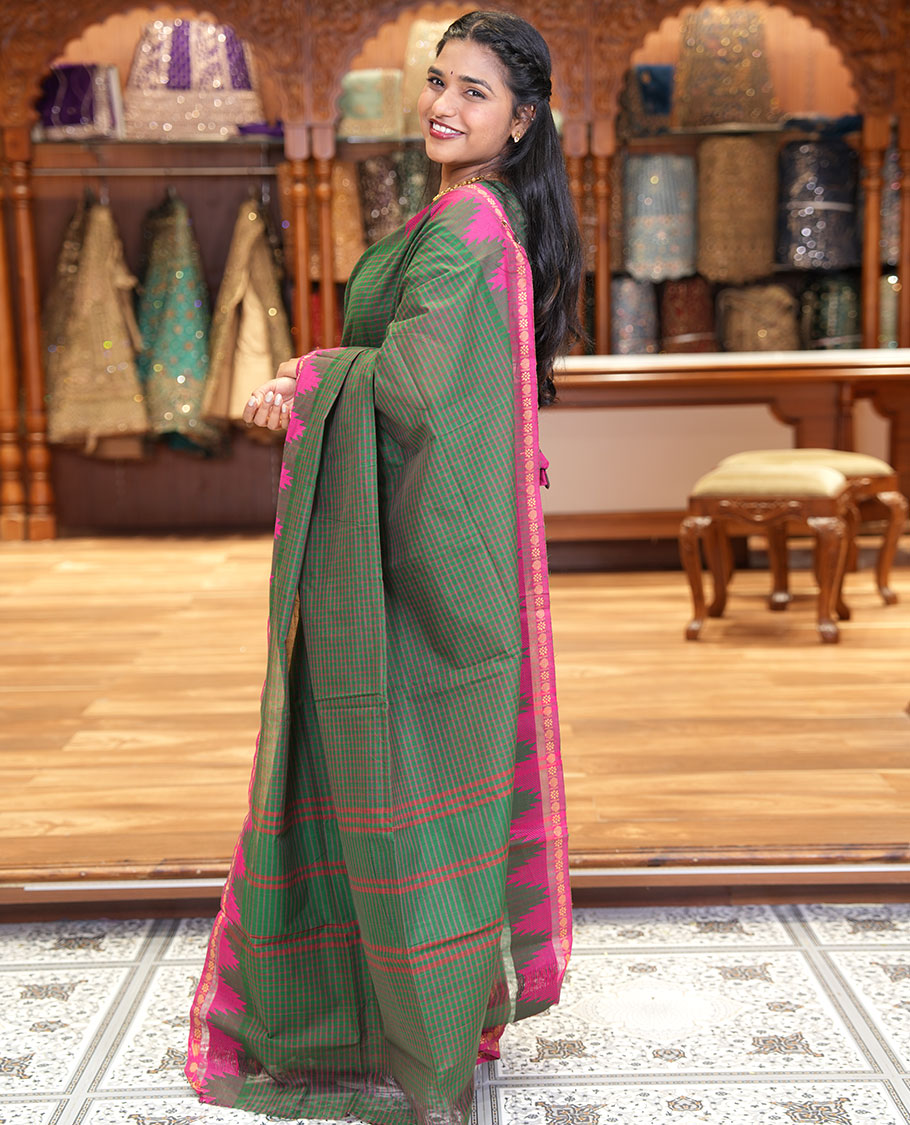 Green Chettinad Cotton Saree, Decked Up with a Checked Design on Its Body, Complemented by a Contrast Temple Border, Subtly Striped Pallu, and Paired with a Matching Blouse