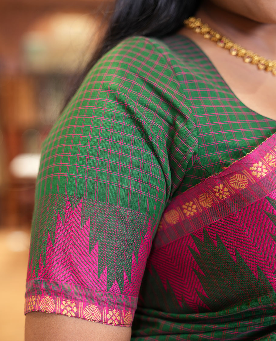 Green Chettinad Cotton Saree, Decked Up with a Checked Design on Its Body, Complemented by a Contrast Temple Border, Subtly Striped Pallu, and Paired with a Matching Blouse