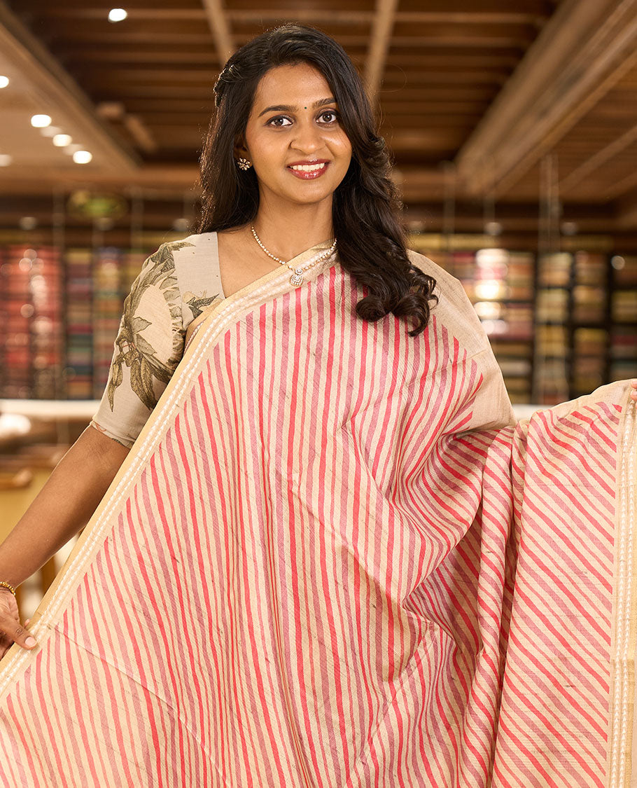 Pink lehariya-style striped semi-tussar saree, contrast resham thread triangle motifs border, diamond printed pallu & contrast printed blouse