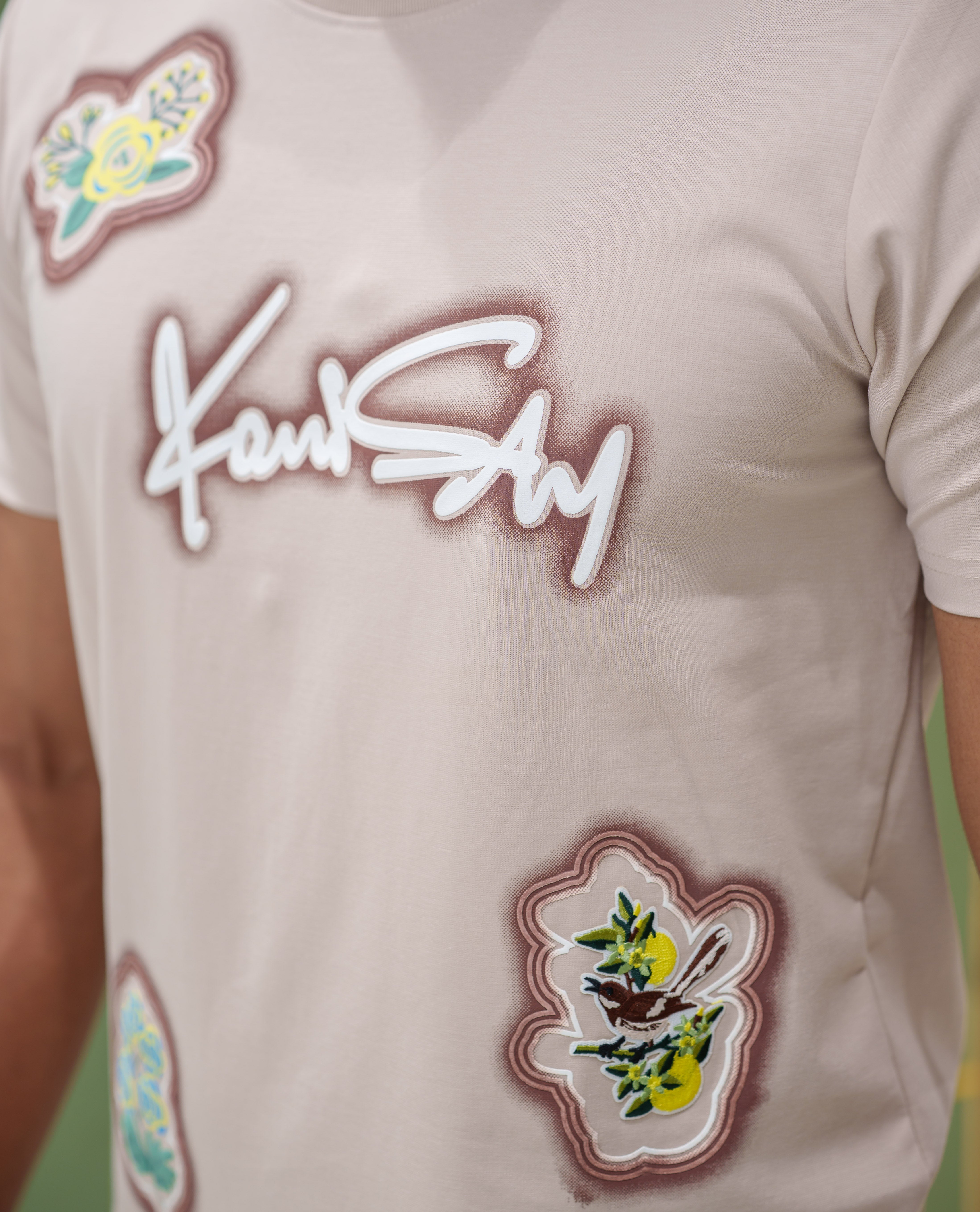 Cream Cotton-Blended T-Shirt, Comes with a Unique Motif Print, a Crew Neck, Half Sleeves, Slim Fit, and Regular Length