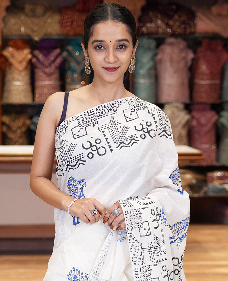 White peacock block printed mul cotton saree, geometric printed border, geometric printed pallu, and a matching block printed blouse