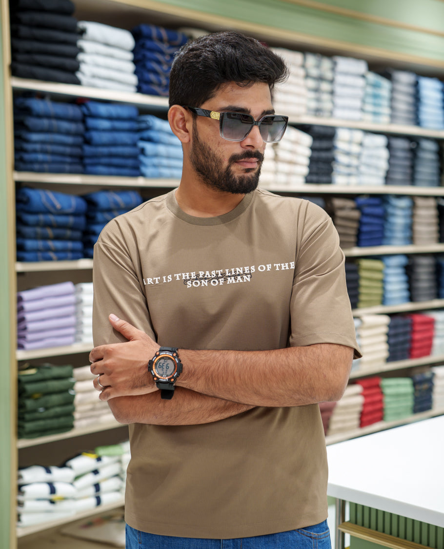 Brown Cotton-Blended T-shirt, Comes with a Unique Back Print, Half-sleeves, Crew Neck, Oversized Fit, and Regular Length