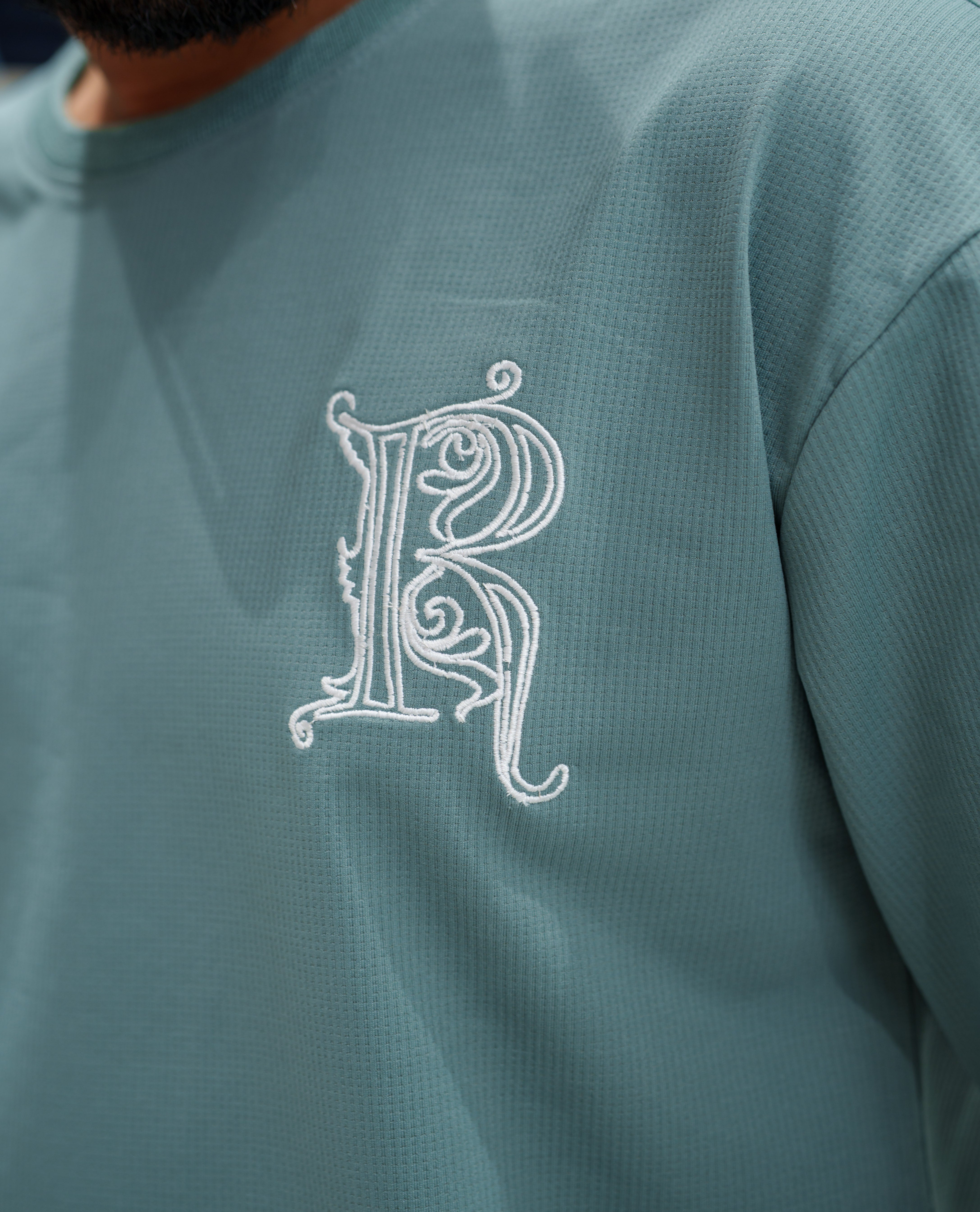 Teal Cotton-Blended T-shirt, Comes with a Unique Back Print, Half-sleeves, Crew Neck, Oversized Fit, and Regular Length