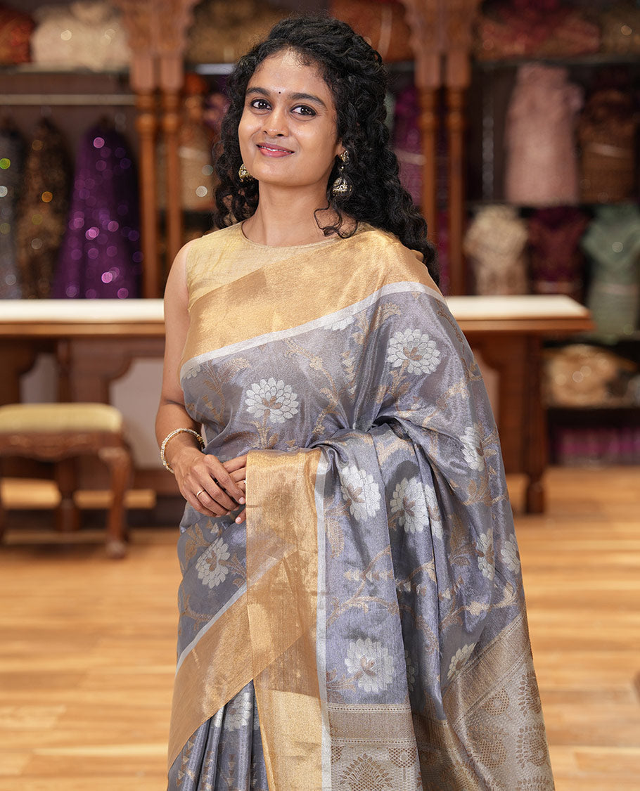 Grey floral jaal jacquard tissue silk saree, contrast bavanji border, floral design pallu, and a scallop design blouse