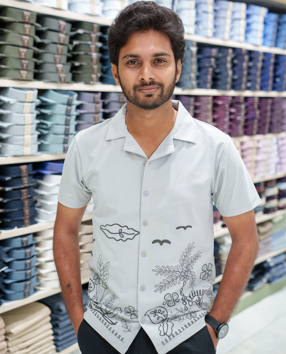 Grey Cotton-Blended Casual Shirt Comes with a Tropical Floral Embroidery, a Cuban Collar Neck, Half Sleeves, a Regular Fit, and Regular Length