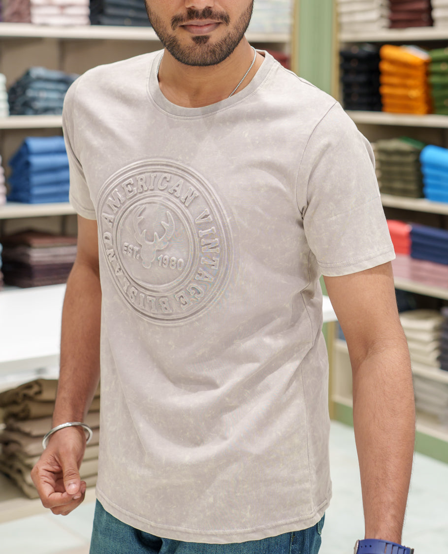 Beige Cotton-Blended Acid-Washed Oversized T-Shirt Comes with a Typographic-Embossed, a Crew Neck, Half Sleeves, and Regular Length