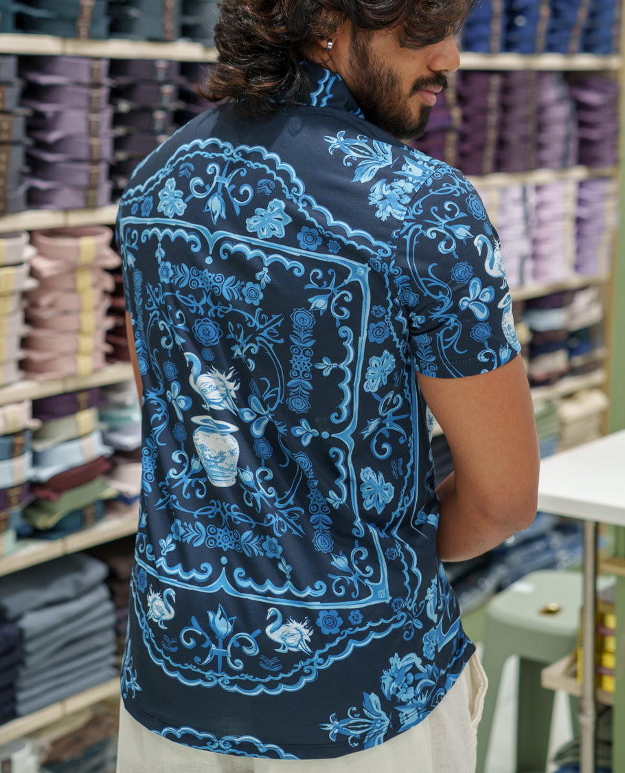 Navy Blue Cotton-Blended Casual Shirt Comes with Floral-Flower Vase Motifs Print, Spread Collar, Half Sleeves, Regular Fit, and Regular Length