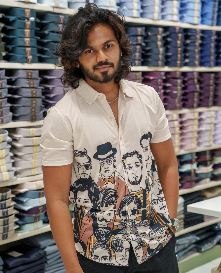 White Cotton-Blended Casual Shirt Comes with Human Figurines Print, Spread Collar, Half Sleeves, Regular Fit, and Regular Length