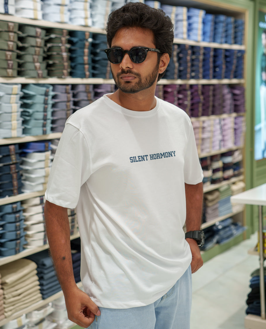 White Cotton-Blended T-Shirt Comes with an Tree-Motifs Back Print, Crew Neck, Half Sleeves, Oversized Fit, and Regular Length