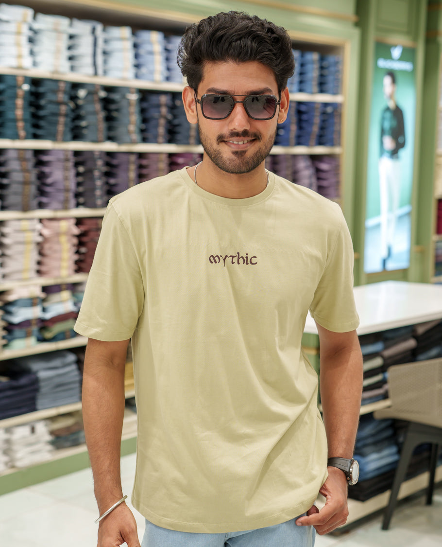 Cream Cotton-Blended T-Shirt Comes with an Deer-Motifs Back Print, Crew Neck, Half Sleeves, Oversized Fit, and Regular Length