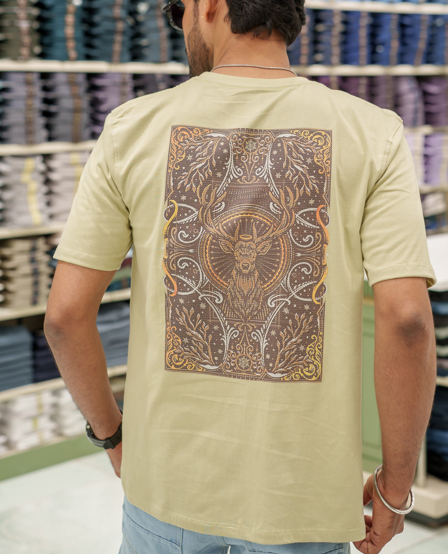 Cream Cotton-Blended T-Shirt Comes with an Deer-Motifs Back Print, Crew Neck, Half Sleeves, Oversized Fit, and Regular Length