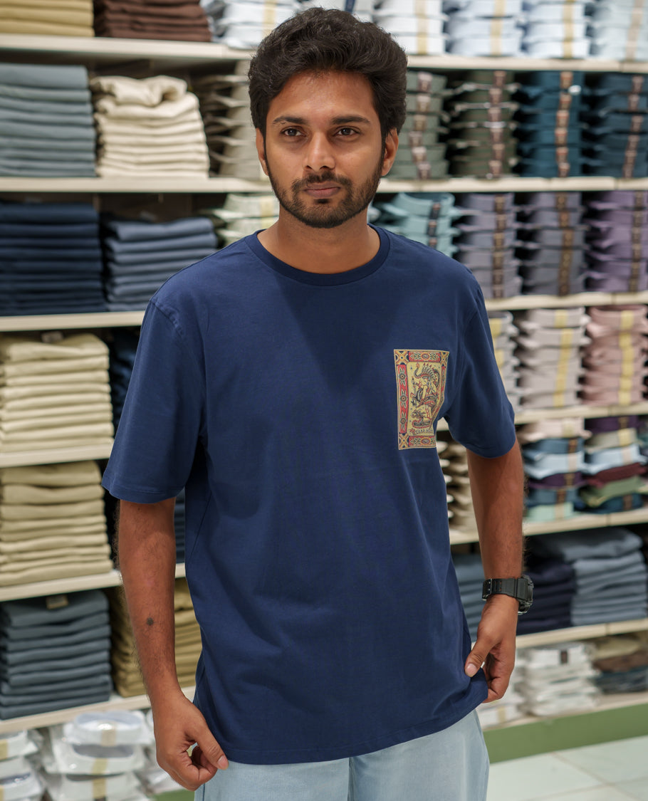 Navy Cotton-Blended T-Shirt Comes with an Tribe-Motifs Back Print, Crew Neck, Half Sleeves, Oversized Fit, and Regular Length