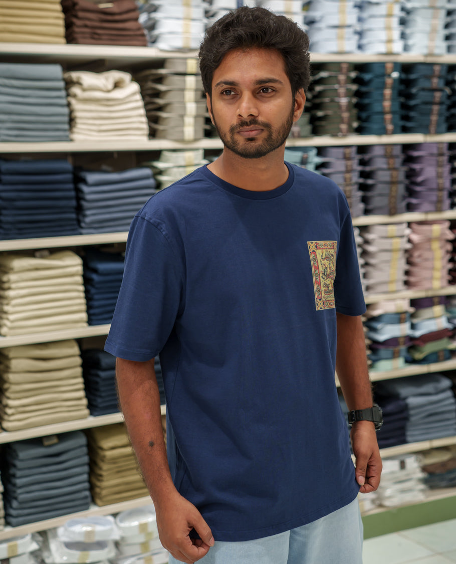 Navy Cotton-Blended T-Shirt Comes with an Tribe-Motifs Back Print, Crew Neck, Half Sleeves, Oversized Fit, and Regular Length