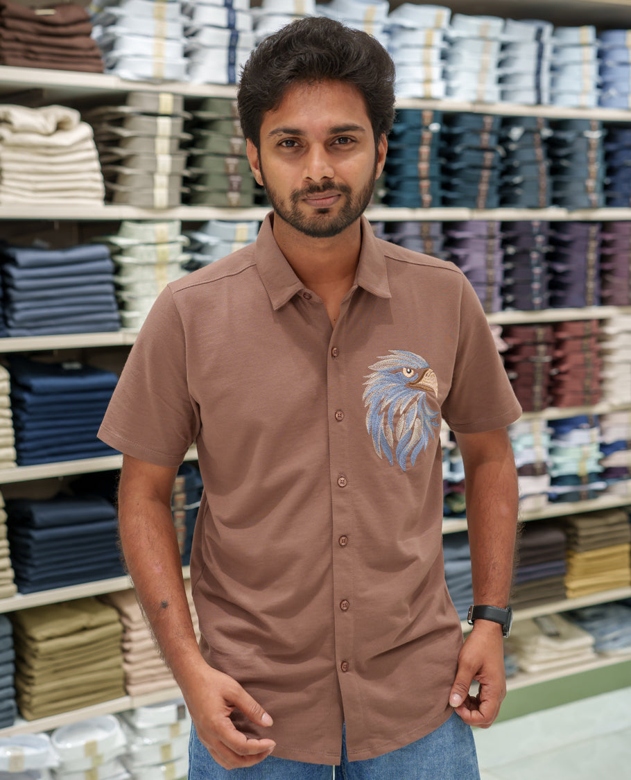 Brown Cotton-Blended Casual Shirt Comes with Eagle Motif Embroidery, Spread Collar, Half Sleeves, Regular Fit, and Regular Length