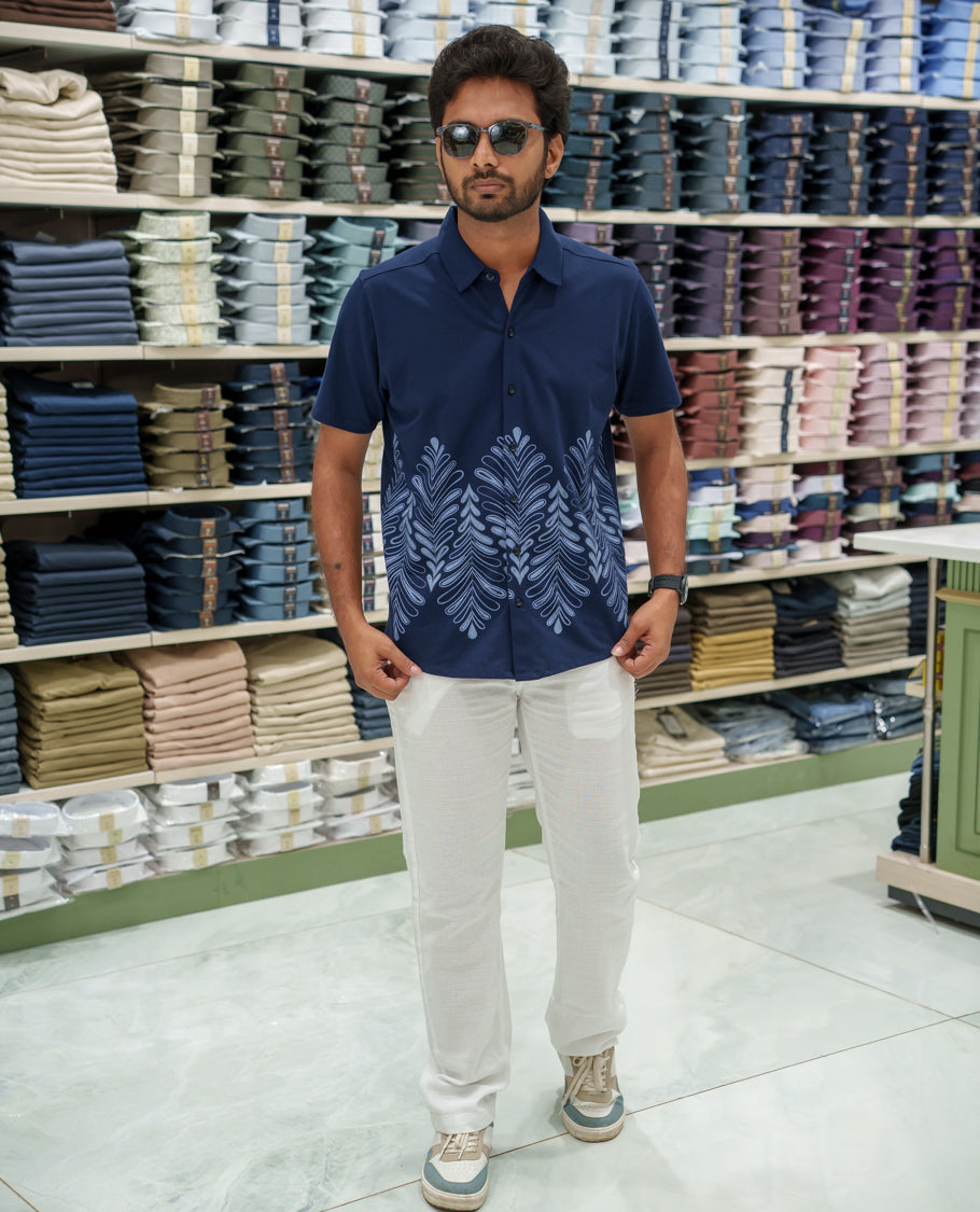 Navy Blue Cotton-Blended Casual Shirt Comes with Tropical Floral Print, Spread Collar, Half Sleeves, Regular Fit, and Regular Length