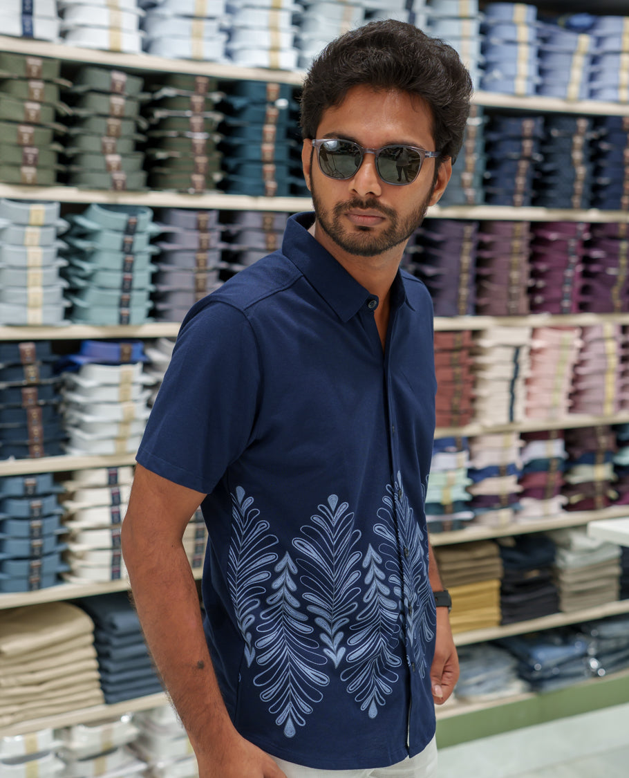 Navy Blue Cotton-Blended Casual Shirt Comes with Tropical Floral Print, Spread Collar, Half Sleeves, Regular Fit, and Regular Length