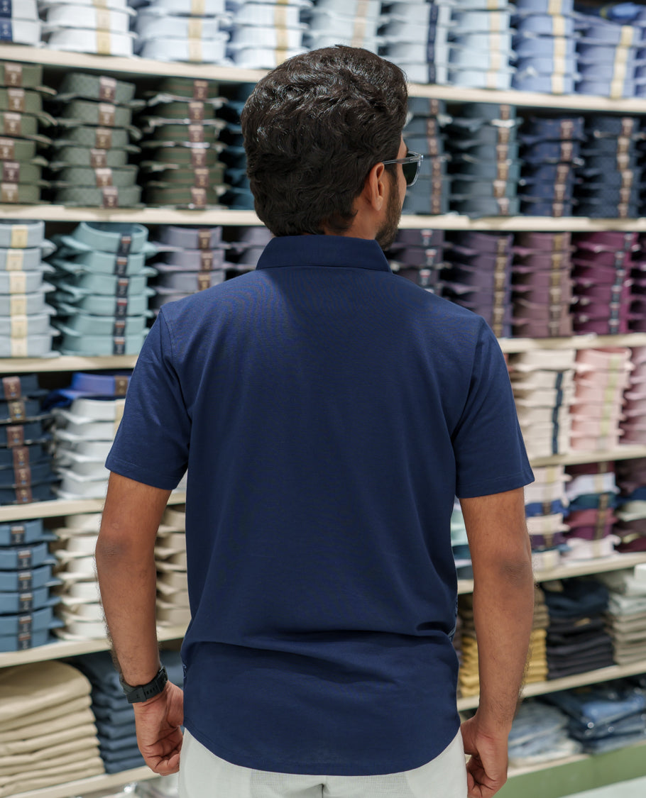 Navy Blue Cotton-Blended Casual Shirt Comes with Tropical Floral Print, Spread Collar, Half Sleeves, Regular Fit, and Regular Length