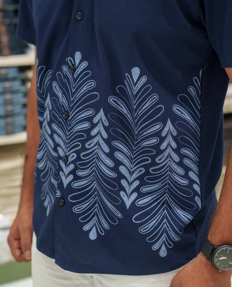 Navy Blue Cotton-Blended Casual Shirt Comes with Tropical Floral Print, Spread Collar, Half Sleeves, Regular Fit, and Regular Length