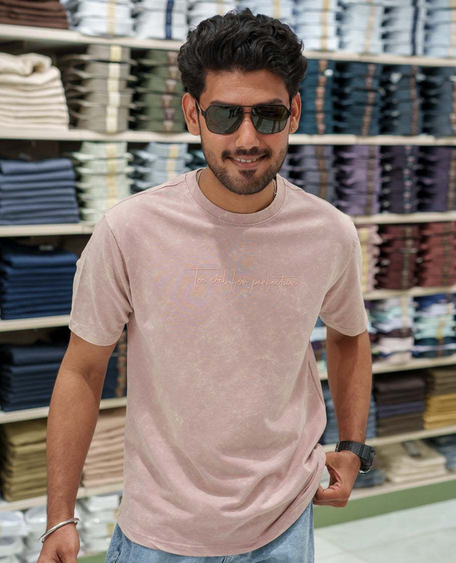 Pink Cotton-Blended Lava-Wash T-Shirt Comes with a Typographic Print, Crew Neck, Half Sleeves, Oversized Fit, and Regular Length