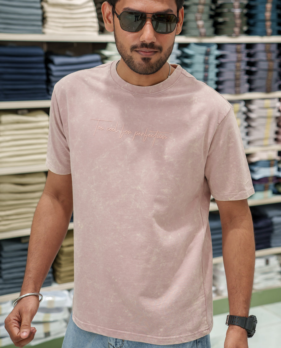 Pink Cotton-Blended Lava-Wash T-Shirt Comes with a Typographic Print, Crew Neck, Half Sleeves, Oversized Fit, and Regular Length